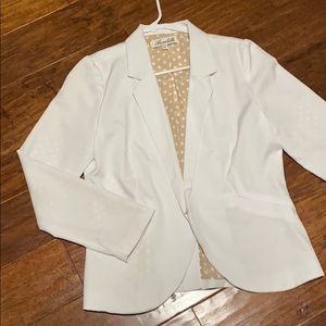 L white blazer